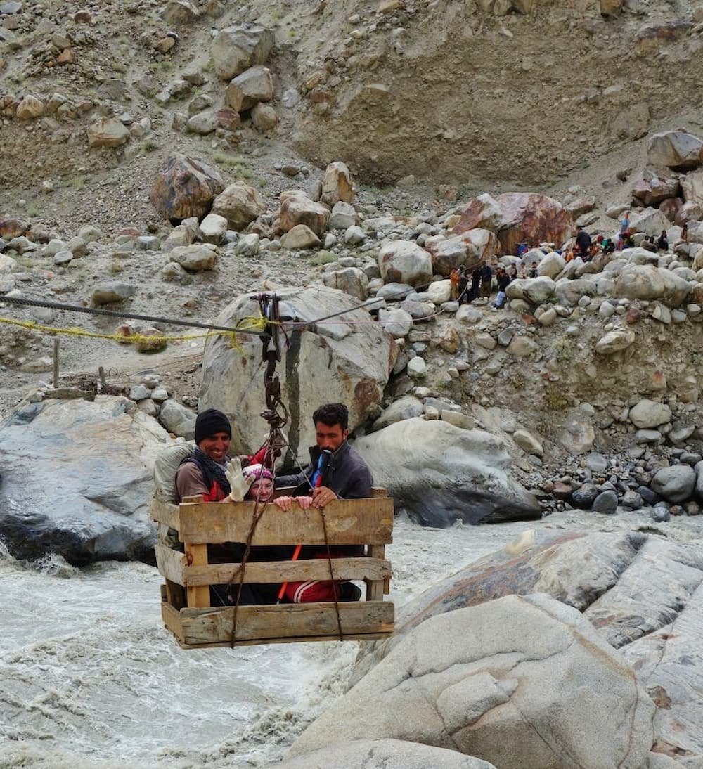 Crossing the river in a basket