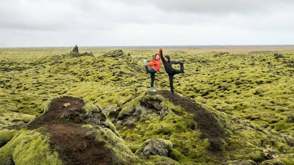 Posing on a mossy lava field