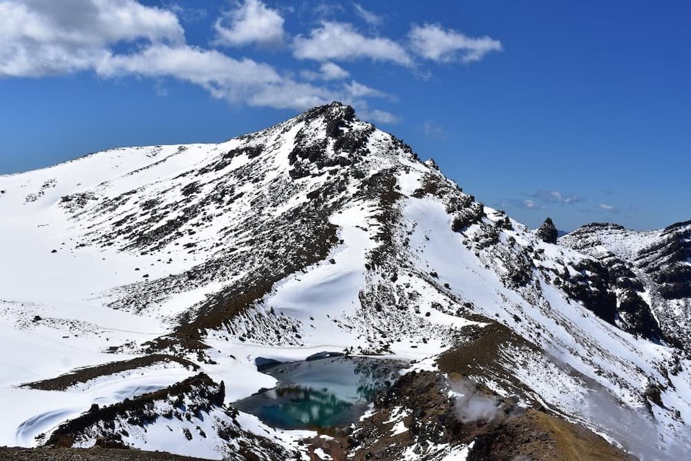 One of the two Emerald Lakes, the reason tourists are flocking in