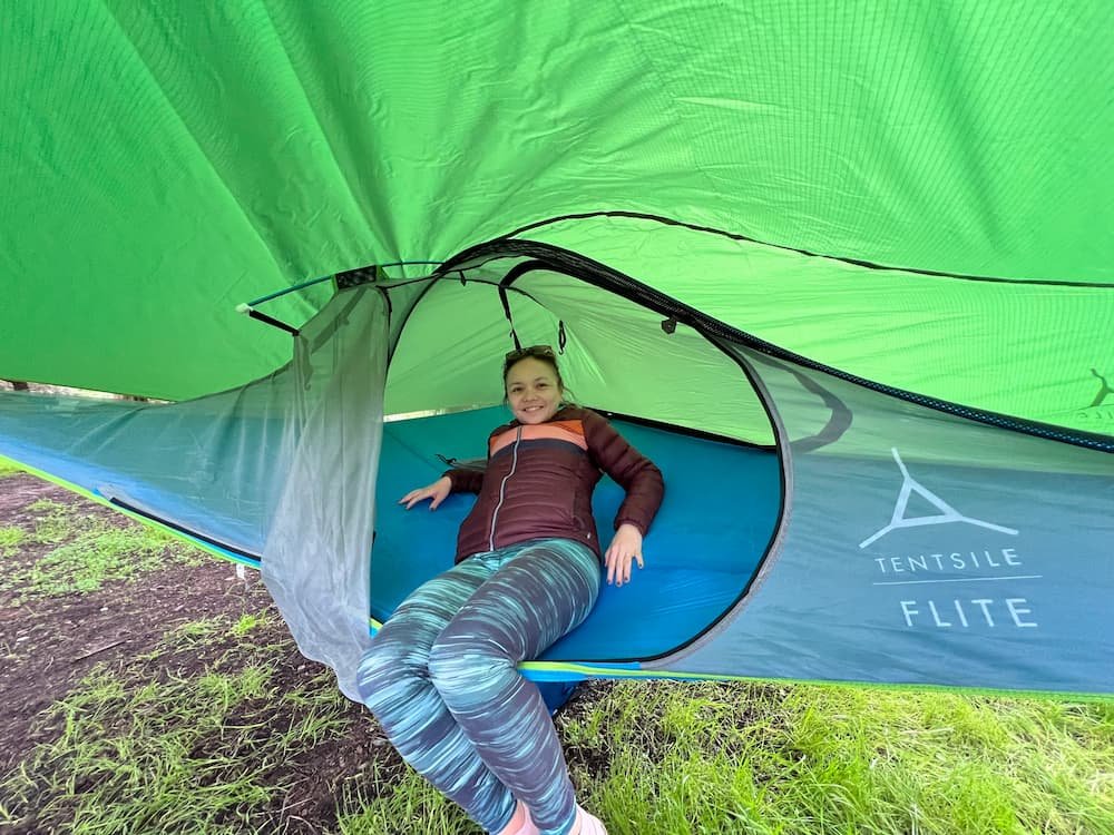 Lisette laying in the tent