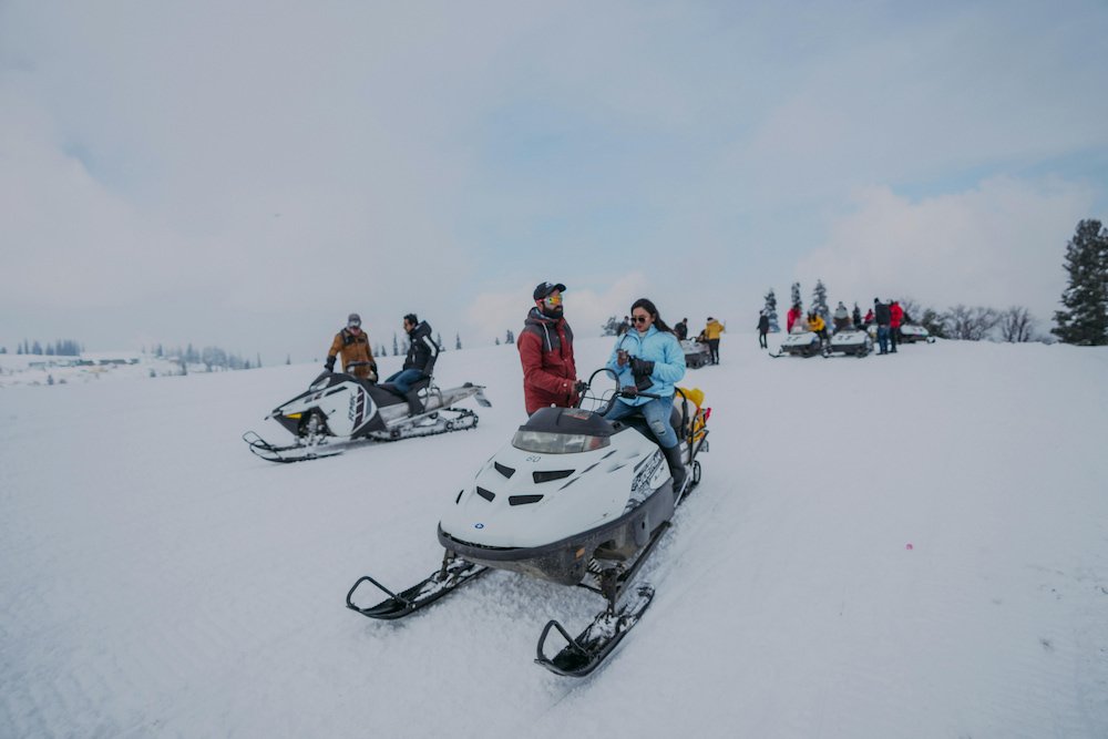 A group of snowmobile enthusiasts